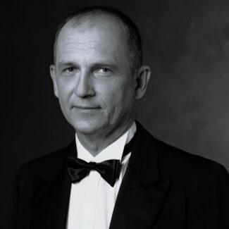 Dariusz Szymaniak jako Orazio, dyrektor teatru (Ottavio)